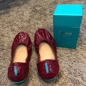 Tieks red patent flats